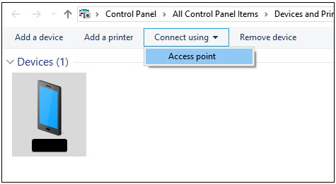 Menú de una PC detectando y seleccionando un dispositivo móvil para realizar un anclaje Bluetooth.