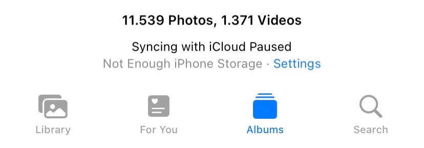 sync with icloud paused in photos